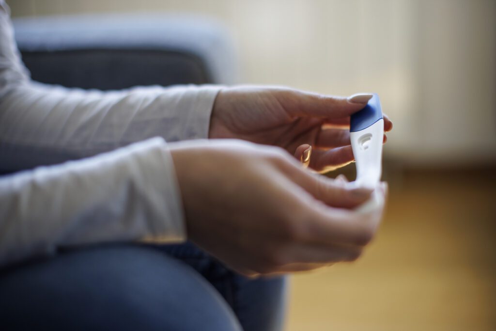 Woman waiting for pregnancy test result