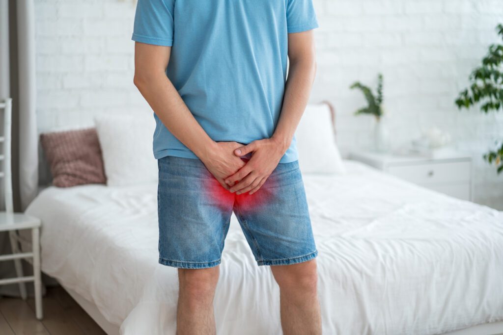 Male fertility concept, pain in prostate, man suffering from prostatitis or from a venereal disease, urological genital infections